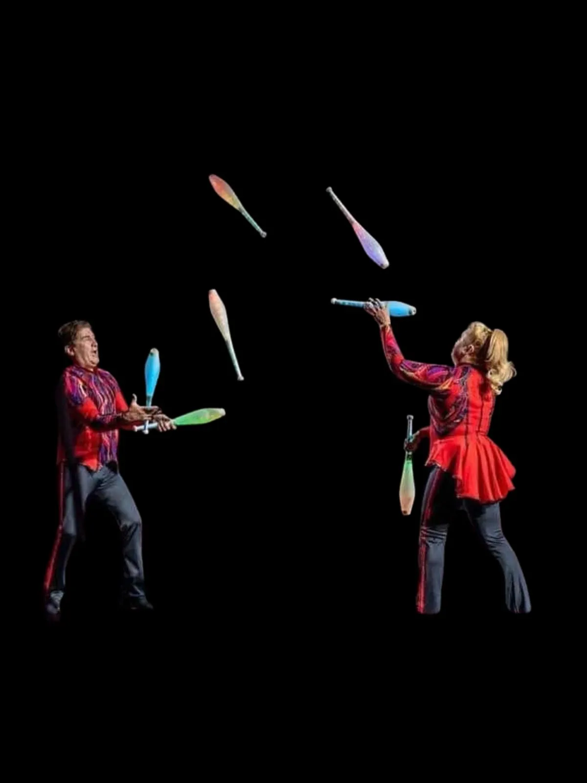 Professional juggler performing with clubs at Toronto entertainment event